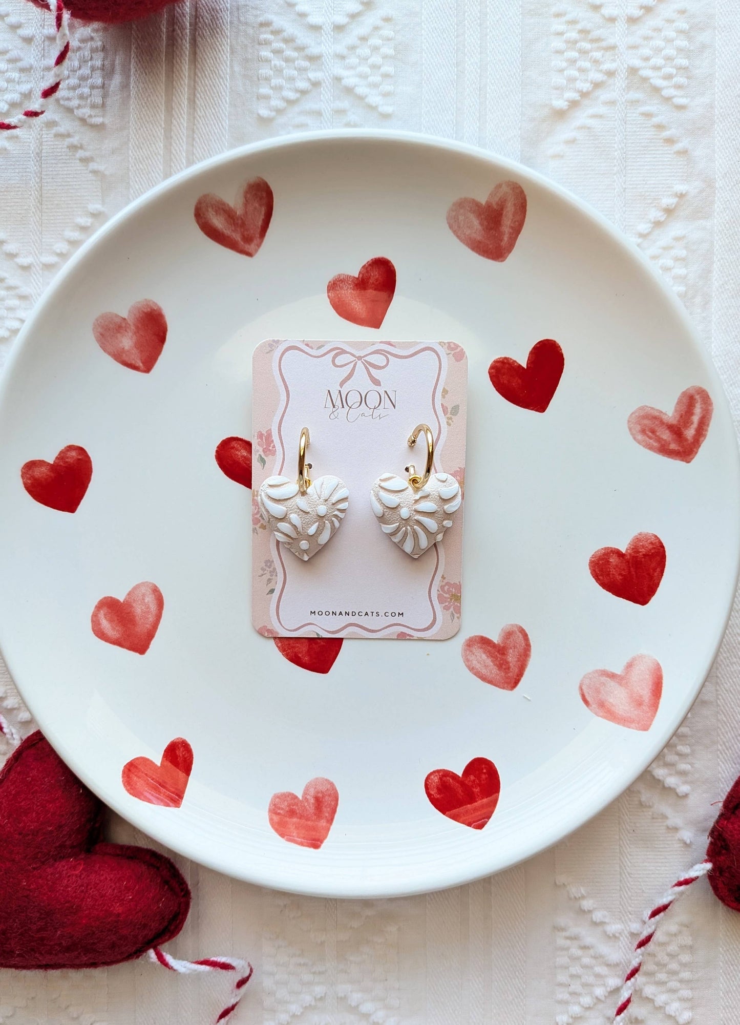 White talavera on beige hearts