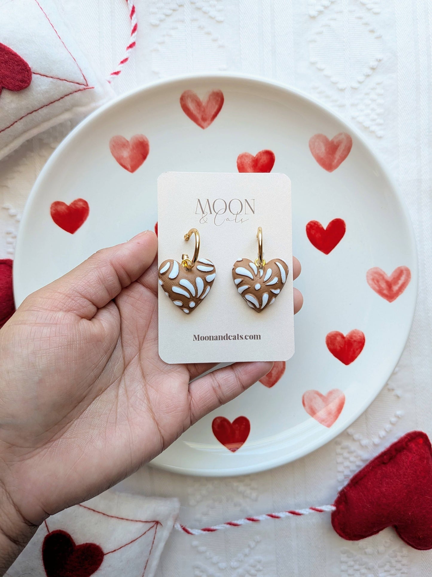 White talavera on brown hearts