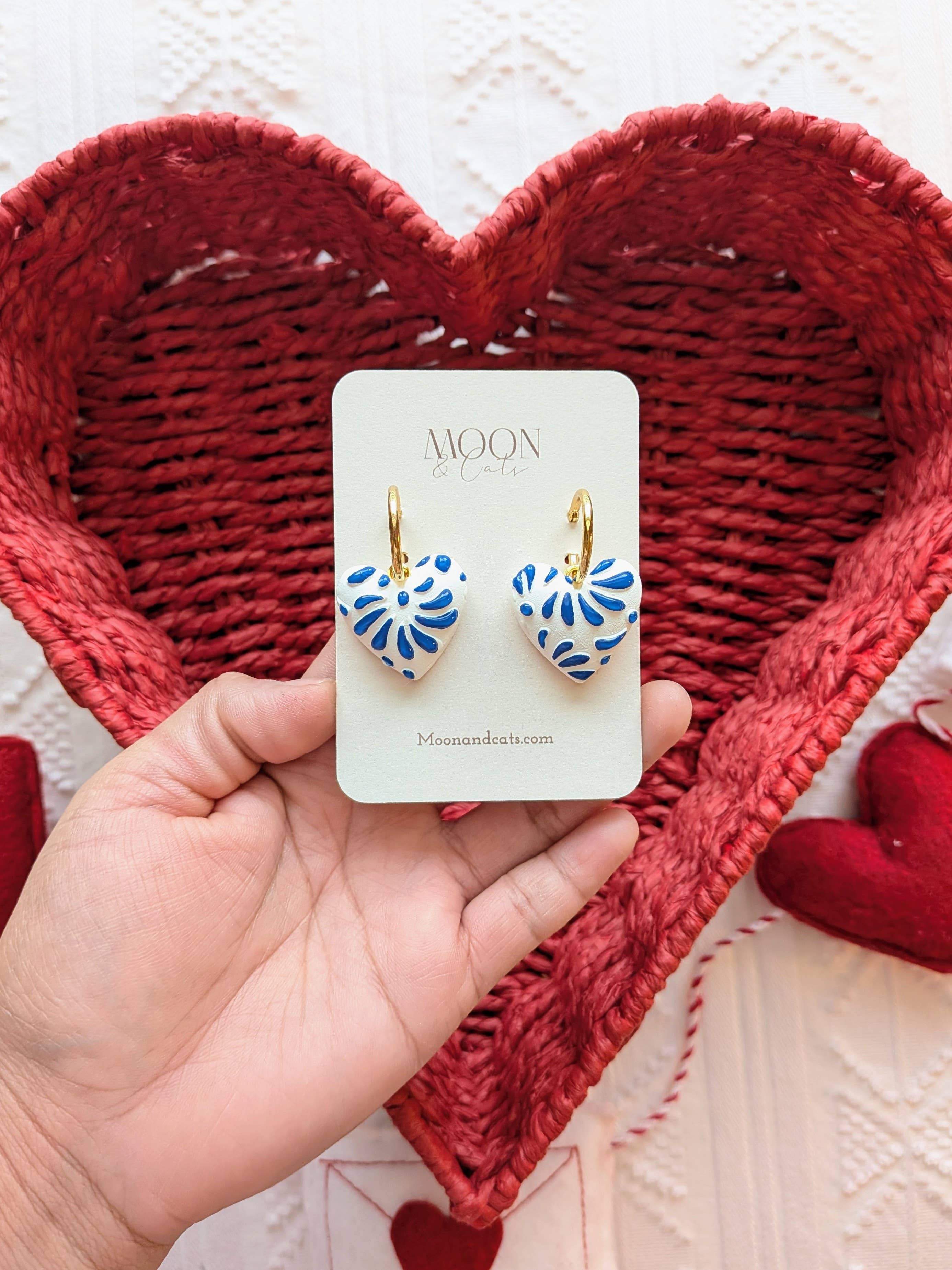 Blue talavera on white hearts