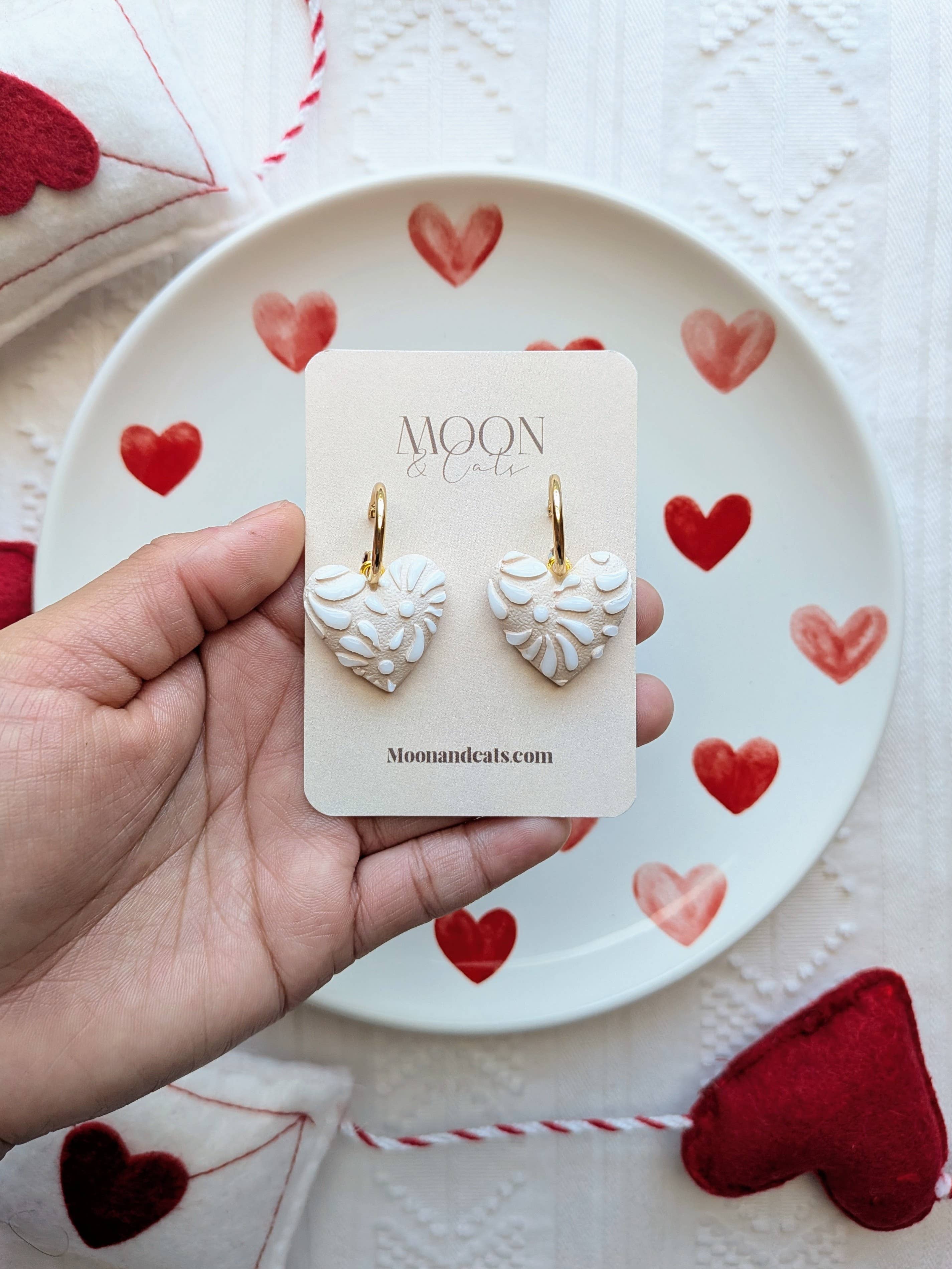 White talavera on beige hearts